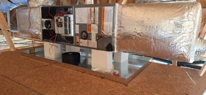 Air handler with sealed sheet metal plenum installed in coastal Georgia