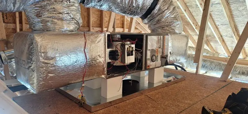 Insulated flex ducts radiating from an attic air handler in coastal Georgia